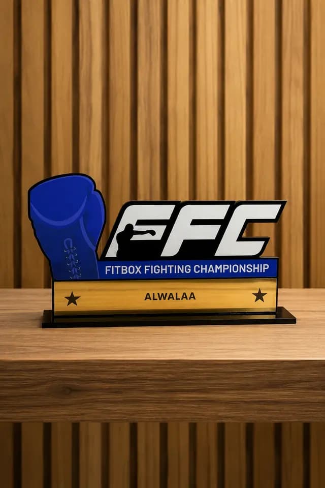 FFC Fitbox Fighting Championship award plaque carrying the Alwalaa name